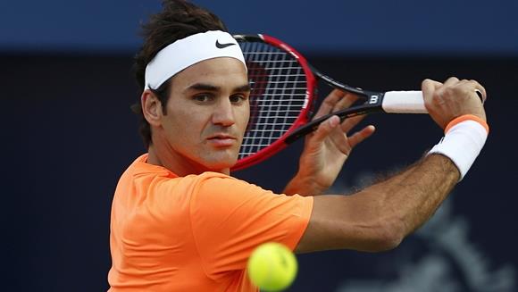 Roger Federer in action against Borna Coric