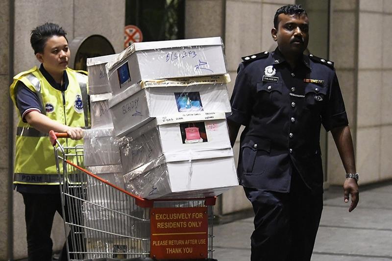 Authorities seize cash and luxury goods linked to former Prime Minister Najib Razak